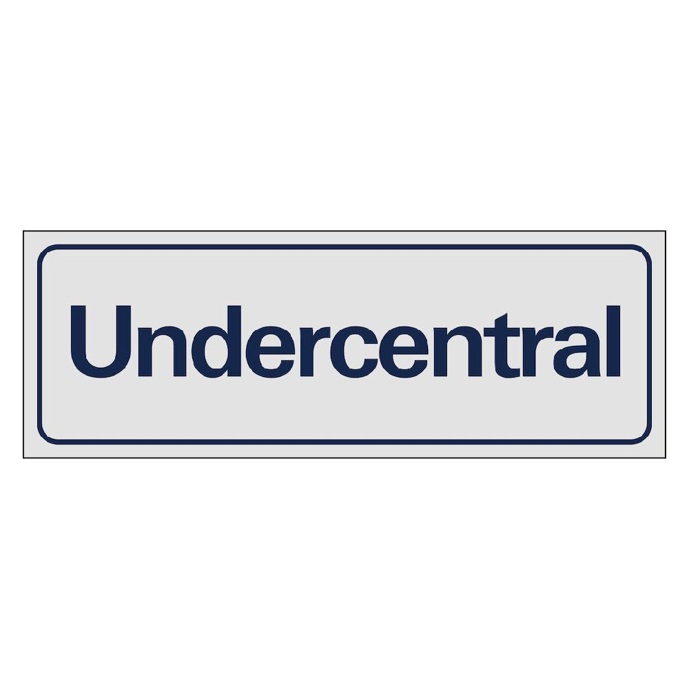 Skylt Undercentral 225x80mm